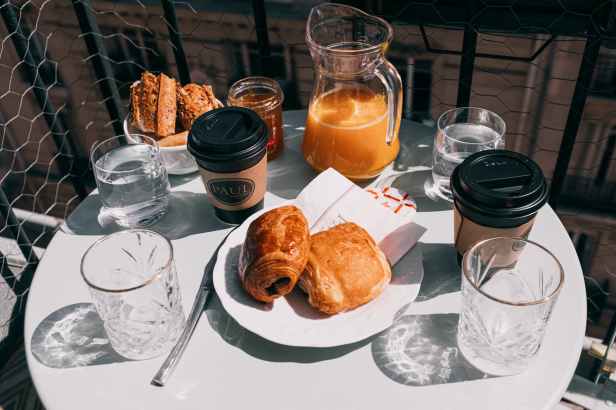 photo of pitcher near handrail
